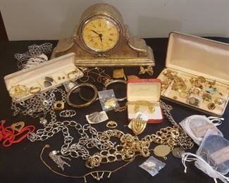 Clock and jewelry assortment. Mix of vintage and new. Clock battery has some corrosion. May work if replaced