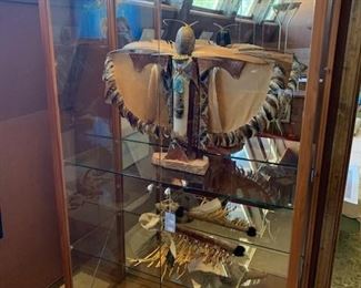 Lighted display cabinet and shaman figure