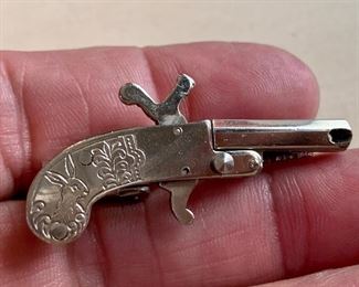 Lot 13:  Gun Tie Tack with Bunny on Handle- made in Austria: $15