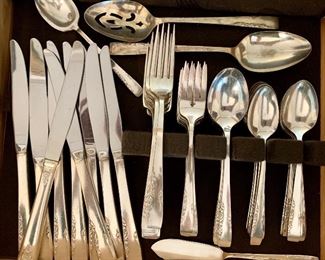 Item 125:  Rogers (Oneida Ltd.) "Proposal":  12 dinner forks, 9 salad forks, 8 soup spoons, 16 teaspoons, 8 knives, 2 serving spoons, 1 butter knife, 1 sauce spoon: $65