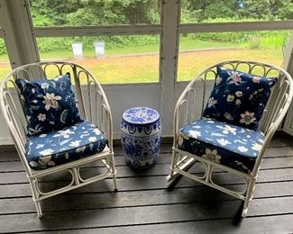 Item 25:  Wicker Chairs - 24.5"l x 20.5"w x 31"h  - the one on the left side of picture is stationery and the other is a rocker): $225 for pair