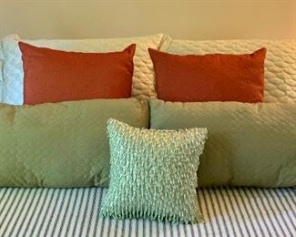 7 color coordinating pillows: $40