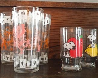 Hazel Atlas kids drinking glasses on left and 1958 United Snoopy juice glasses on left