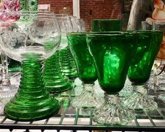 Arc green stem wine or cordial glass on left