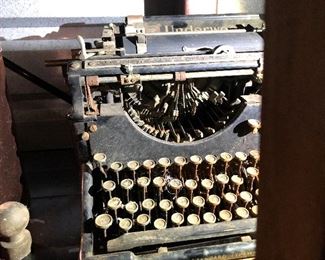 ONE OF SEVERAL ANTIQUE TYPEWRITERS