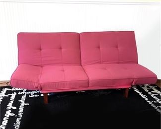 Lot 140
Upholstered Fuchsia Pink Futon