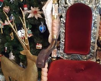 Christmas tree, fancy chair, metal reindeer