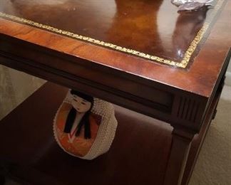 Leather top side table, one of a pair