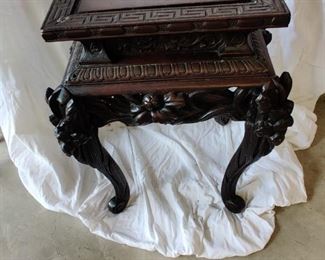 heavily carved marble top end table