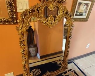 very large ornate gold leaf mirror