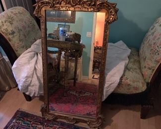 very nice gold-framed mirror
