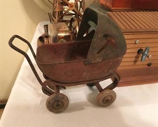 Cast iron doll buggy
