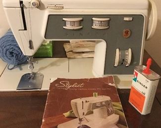 Singer Stylist sewing machine with cabinet and chair
