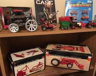 Precision Series Dearborn plow and blade, and 1957 Ford Workmaster with loader 