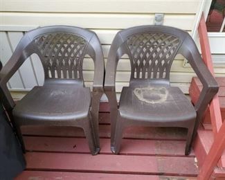 Pair of Brown Hard Plastic Lawn Chairs