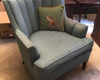 Mid-century blue tone-on-tone floral jacquard upholstered channel back armchair. 