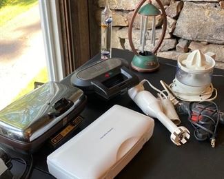 Small appliances include a citrus juicer, waffle iron, slow cooker, potpourri crock pot, electric knife, hand blender, hot glue gun...and wind chimes. I have been listening to these while working. So cool!