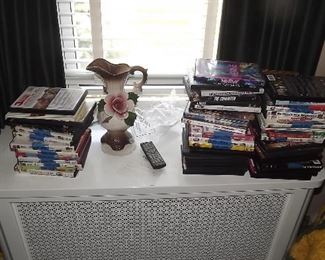 vhs, dvds, and Capodimonte pitcher 