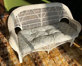 Wicker loveseat.