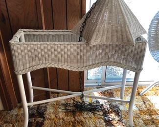 Wicker plant stand and lamp shade.