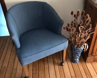 Four marching club chairs upholstered by Tamarack.