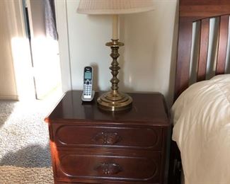 One of two matching nightstands by Carl Forslund.