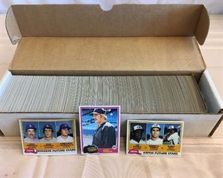 Lot #	Lot Name
1	1974 Topps Baseball Complete Set with Traded & Red Checklist sets EX/MT to Near Mint
2	1980 Topps Baseball Complete Set Rickey Henderson Rookie RC MINT
3	1981 Donruss Baseball Complete Set MINT Condition
4	1981 Fleer Baseball Complete Set Mint
5	1981 Topps Baseball Complete Set Near Mint to Mint Condition Overall  726 cards
6	1981 Topps Baseball Complete Set NM/MT Kirk Gibson Valenzuela Raines Rookies Mint
7	1981 Topps Football Complete Set Joe Montana Rookie RC Near Mint to Mint Condition Overall 528 Cards
8	1982 Donruss Baseball Factory Set Ripken RC MINT!
9	1982 Fleer Baseball Complete Set 626 Cal Ripken Jr. RC MINT
10	1982 Topps Baseball Complete Set Cal Ripken Jr. RC
11	1983 Donruss Baseball Complete Set Gwynn Boggs  Sandberg Rookie Cards MINT
12	1983 Fleer Baseball Complete Set MINT Boggs Sandberg Gwynn Rookie Cards
13	1983 Topps Baseball Complete Set Gwynn Boggs Sandberg Rookies MINT
14	1984 Fleer Baseball Complete Set MINT Mattingly RC
15	1984 Topps Baseball Co