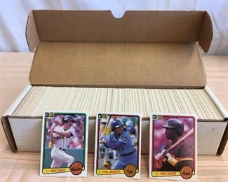 Lot #	Lot Name
1	1974 Topps Baseball Complete Set with Traded & Red Checklist sets EX/MT to Near Mint
2	1980 Topps Baseball Complete Set Rickey Henderson Rookie RC MINT
3	1981 Donruss Baseball Complete Set MINT Condition
4	1981 Fleer Baseball Complete Set Mint
5	1981 Topps Baseball Complete Set Near Mint to Mint Condition Overall  726 cards
6	1981 Topps Baseball Complete Set NM/MT Kirk Gibson Valenzuela Raines Rookies Mint
7	1981 Topps Football Complete Set Joe Montana Rookie RC Near Mint to Mint Condition Overall 528 Cards
8	1982 Donruss Baseball Factory Set Ripken RC MINT!
9	1982 Fleer Baseball Complete Set 626 Cal Ripken Jr. RC MINT
10	1982 Topps Baseball Complete Set Cal Ripken Jr. RC
11	1983 Donruss Baseball Complete Set Gwynn Boggs  Sandberg Rookie Cards MINT
12	1983 Fleer Baseball Complete Set MINT Boggs Sandberg Gwynn Rookie Cards
13	1983 Topps Baseball Complete Set Gwynn Boggs Sandberg Rookies MINT
14	1984 Fleer Baseball Complete Set MINT Mattingly RC
15	1984 Topps Baseball Co