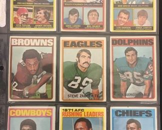 Lot #	Lot Name
1	1974 Topps Baseball Complete Set with Traded & Red Checklist sets EX/MT to Near Mint
2	1980 Topps Baseball Complete Set Rickey Henderson Rookie RC MINT
3	1981 Donruss Baseball Complete Set MINT Condition
4	1981 Fleer Baseball Complete Set Mint
5	1981 Topps Baseball Complete Set Near Mint to Mint Condition Overall  726 cards
6	1981 Topps Baseball Complete Set NM/MT Kirk Gibson Valenzuela Raines Rookies Mint
7	1981 Topps Football Complete Set Joe Montana Rookie RC Near Mint to Mint Condition Overall 528 Cards
8	1982 Donruss Baseball Factory Set Ripken RC MINT!
9	1982 Fleer Baseball Complete Set 626 Cal Ripken Jr. RC MINT
10	1982 Topps Baseball Complete Set Cal Ripken Jr. RC
11	1983 Donruss Baseball Complete Set Gwynn Boggs  Sandberg Rookie Cards MINT
12	1983 Fleer Baseball Complete Set MINT Boggs Sandberg Gwynn Rookie Cards
13	1983 Topps Baseball Complete Set Gwynn Boggs Sandberg Rookies MINT
14	1984 Fleer Baseball Complete Set MINT Mattingly RC
15	1984 Topps Baseball Co