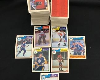 Lot #	Lot Name
1	1974 Topps Baseball Complete Set with Traded & Red Checklist sets EX/MT to Near Mint
2	1980 Topps Baseball Complete Set Rickey Henderson Rookie RC MINT
3	1981 Donruss Baseball Complete Set MINT Condition
4	1981 Fleer Baseball Complete Set Mint
5	1981 Topps Baseball Complete Set Near Mint to Mint Condition Overall  726 cards
6	1981 Topps Baseball Complete Set NM/MT Kirk Gibson Valenzuela Raines Rookies Mint
7	1981 Topps Football Complete Set Joe Montana Rookie RC Near Mint to Mint Condition Overall 528 Cards
8	1982 Donruss Baseball Factory Set Ripken RC MINT!
9	1982 Fleer Baseball Complete Set 626 Cal Ripken Jr. RC MINT
10	1982 Topps Baseball Complete Set Cal Ripken Jr. RC
11	1983 Donruss Baseball Complete Set Gwynn Boggs  Sandberg Rookie Cards MINT
12	1983 Fleer Baseball Complete Set MINT Boggs Sandberg Gwynn Rookie Cards
13	1983 Topps Baseball Complete Set Gwynn Boggs Sandberg Rookies MINT
14	1984 Fleer Baseball Complete Set MINT Mattingly RC
15	1984 Topps Baseball Co