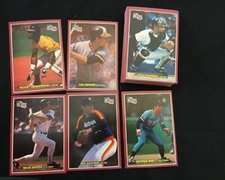 Lot #	Lot Name
1	1974 Topps Baseball Complete Set with Traded & Red Checklist sets EX/MT to Near Mint
2	1980 Topps Baseball Complete Set Rickey Henderson Rookie RC MINT
3	1981 Donruss Baseball Complete Set MINT Condition
4	1981 Fleer Baseball Complete Set Mint
5	1981 Topps Baseball Complete Set Near Mint to Mint Condition Overall  726 cards
6	1981 Topps Baseball Complete Set NM/MT Kirk Gibson Valenzuela Raines Rookies Mint
7	1981 Topps Football Complete Set Joe Montana Rookie RC Near Mint to Mint Condition Overall 528 Cards
8	1982 Donruss Baseball Factory Set Ripken RC MINT!
9	1982 Fleer Baseball Complete Set 626 Cal Ripken Jr. RC MINT
10	1982 Topps Baseball Complete Set Cal Ripken Jr. RC
11	1983 Donruss Baseball Complete Set Gwynn Boggs  Sandberg Rookie Cards MINT
12	1983 Fleer Baseball Complete Set MINT Boggs Sandberg Gwynn Rookie Cards
13	1983 Topps Baseball Complete Set Gwynn Boggs Sandberg Rookies MINT
14	1984 Fleer Baseball Complete Set MINT Mattingly RC
15	1984 Topps Baseball Co