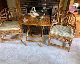 Wicker collapsable Table and two wicker Or rattan chairs