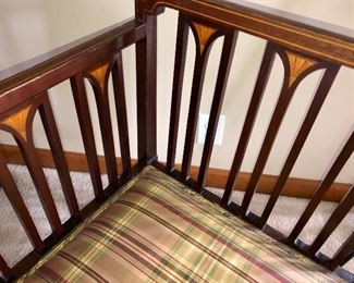 We are still researching this piece. This is a beautiful mahogany occasional chair with maple inlay. Maybe French, maybe Italian and maybe not!