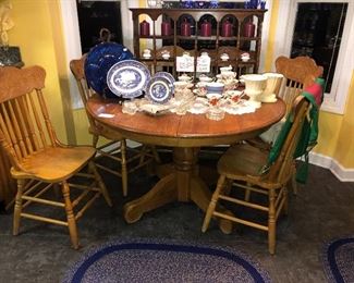 kitchen table display of Royal Albert cup saucer and flower of the month series