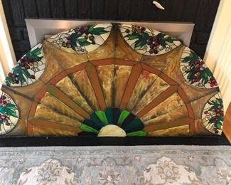 Stained glass half round window panel