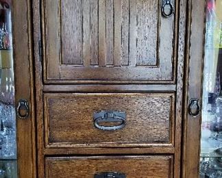 A different and unique china storage cabinet.