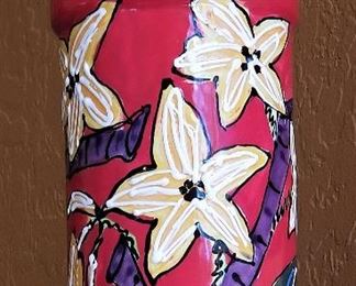 Heavy red flowered handmade pottery.