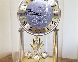 Domed glass mantel clock
