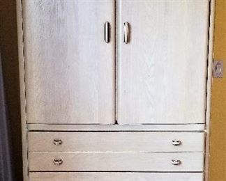 Light colored whitewashed wood furniture set. Great storage and/or conceal your tv.
