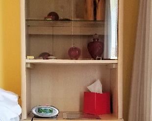 Matching cabinet set one for each side of the bed. Tray pulls out to use as a nightstand. Light colored whitewashed wood furniture set.