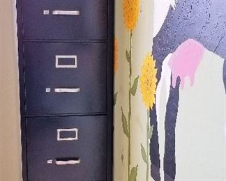 Black metal file cabinet.