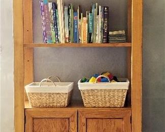 Really nice wood shelving and storage unit. Not too big and not too small. This can fit in a lot of places...even a bathroom.