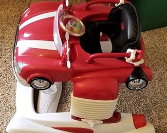Red car for baby to bounce in.