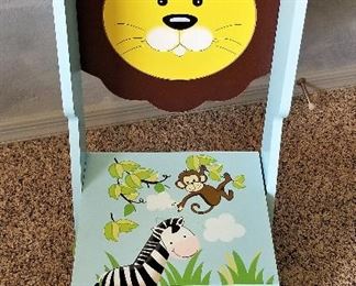 Lion wooden chair that converts to a little step stool for toddler to reach the bathroom sink or ???