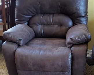 Electric dark brown recliner.