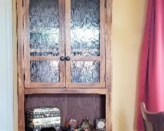Another unique glass and wood storage cabinet. This can be used in so many places; even in a kitchen,