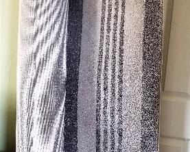 Light and dark gray large rug. there is a matching runner.