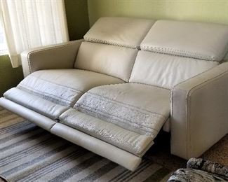 Copenhagen electric leather very light gray sofa with 2 recliners. Purchased recently. Like new.