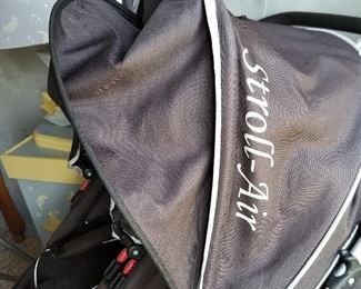 Twin baby stroller with all the accessories some of which have never been open. 