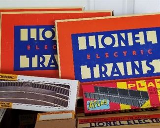 Lionel train tracks and Lionel trains and Lionel accessories.